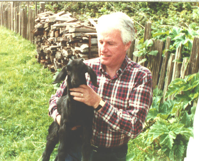 Hibbard with a newborn lamb